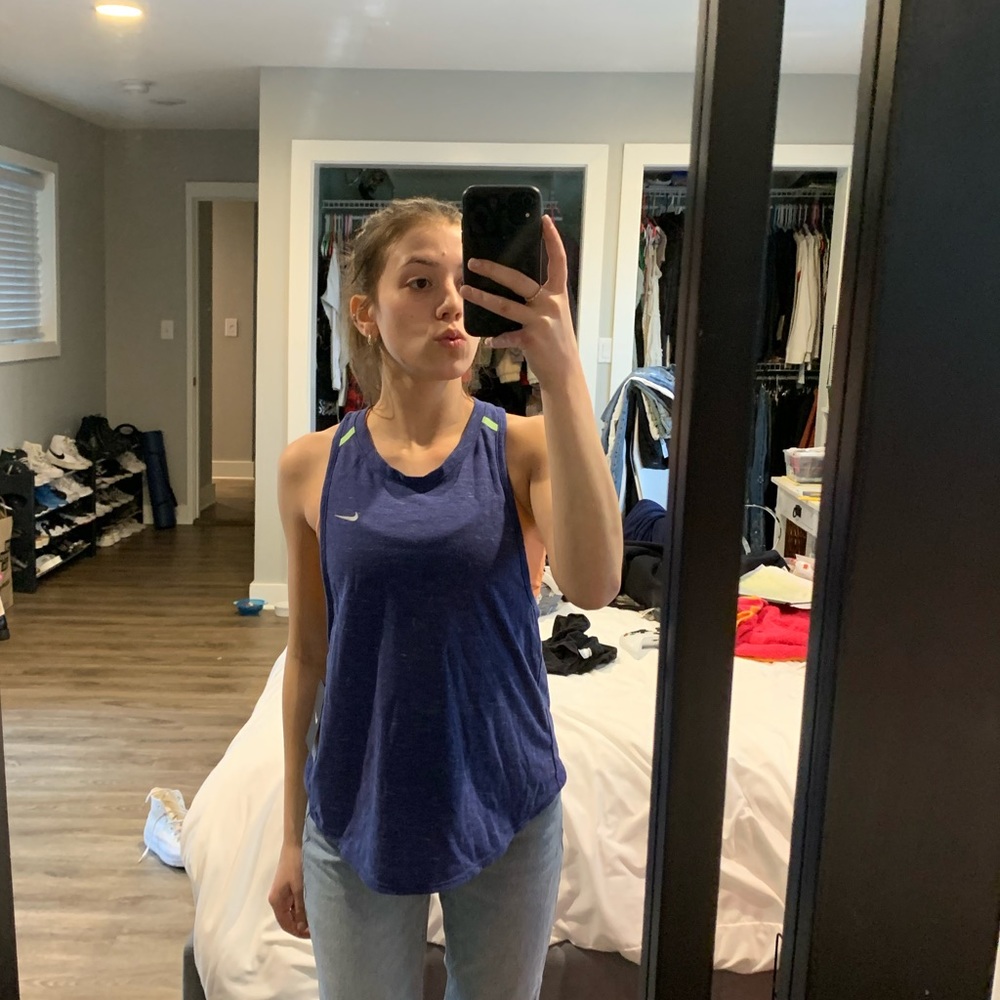 Brand new nike workout tank!! Perfect condition, never worn before.